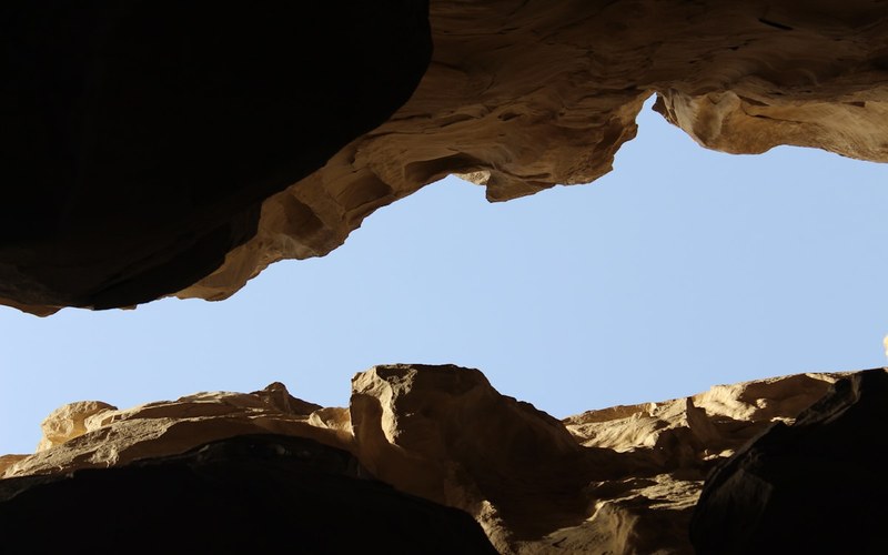 Narrow canyon opening to a bright strip of sky, Chahkouh, Iran